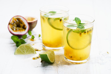passion fruit with lime and mint leaves