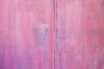 Fototapeta na wymiar old pink rough weathered textured background