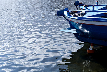 Obraz premium Lake of Ganzirri, Messina, Sicily, Italy, wooden fishing boat