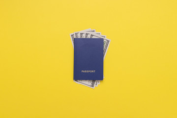 Passports and Banknotes of dollars on the Yellow background. Minimalist style. The concept of...