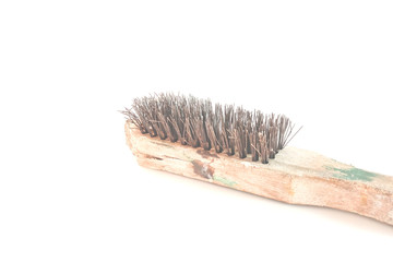 The steel wire brush was placed on a white background.