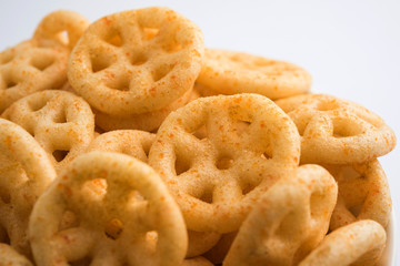 Kaju Katli is a Diamond shape Indian sweet made using cashew sugar and mava, served in a plate or bowl over moody background. selective focus