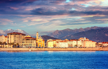 Beautiful city and sea landscape. Ajaccio is the capital of Corsica at sunset, the mountains and...