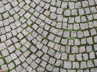 Rock grey road paving texture background of old city