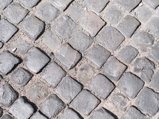 Rock grey road paving texture background of old city