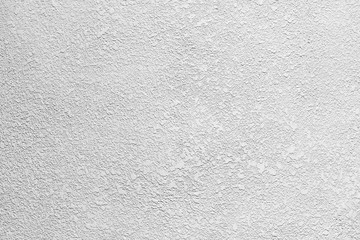 Grungy white concrete wall with dirty and cracked background. Background from high detailed...