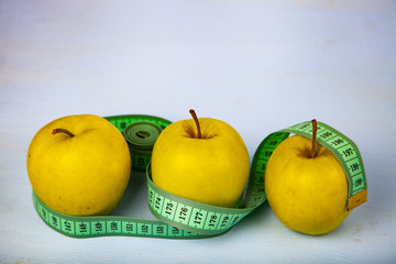 Apples and measuring tape