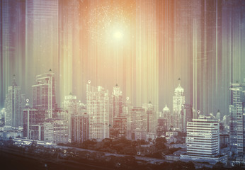 Double exposure of cityscape with connectivity technology icons. Smart connection city concept.
