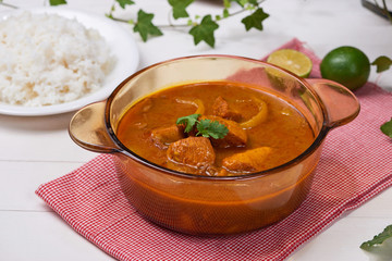 Homemade delicious chicken curry with coconut milk and spies
