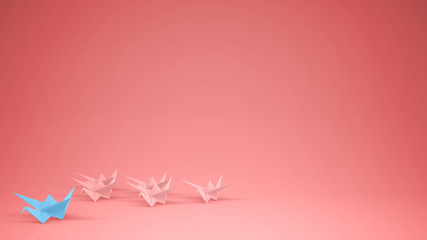 Origami blue paper crane leading group of cranes, leadership motivation concept idea with copy space, pink background