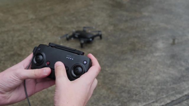 Drone controller being set up. slow motion.