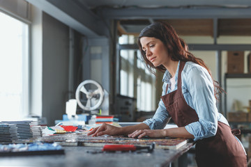 Young woman in workshop