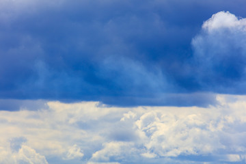 Clouds on a blue sky as a background