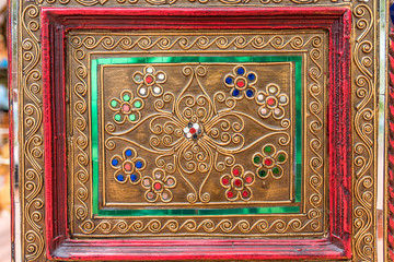 chest with beautiful decorative geometric ornaments with gemstones in Buddhist temple