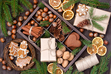 Christmas food background. Fruits, cookies, spices and nuts. Top view
