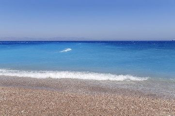 Fototapeta na wymiar Blue turquoise harmony sea gentle waves at the coast