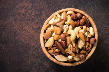 Nuts assortment in a bowl top view.