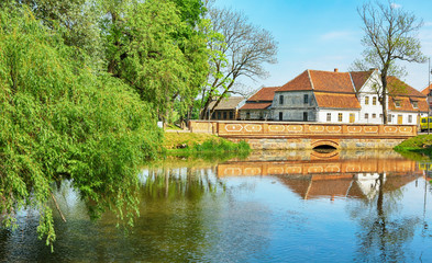Fototapeta na wymiar River Aleksupite in the town Kuldiga, Latvia