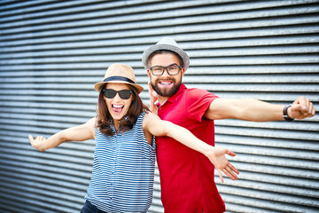 Portrait of excited couple on vacation