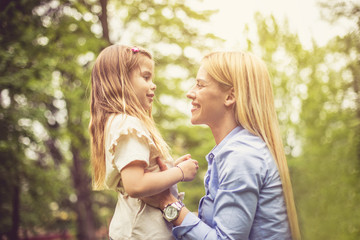 Fototapeta premium Smiling mother and daughter.