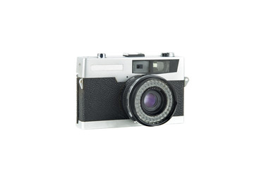 vintage film camera isolated in white background / portrait of an old camera in silver colored metal