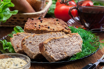 Fototapeta na wymiar Homemade delicious meat pate with chicken liver on a plate
