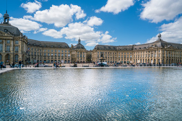 Bordeaux, France, 10 may 2018 : Tourists visiting the Place de la Bourse seen from the boulevard...