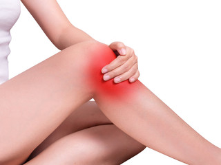 Obraz na płótnie Canvas woman suffering from knee pain, joint pains. red color highlight at knee isolated on white background. health care and medical concept