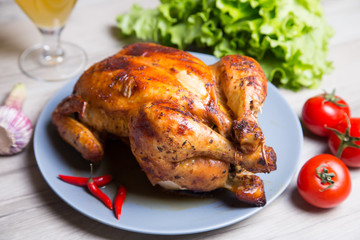 Chicken baked whole. Selective focus, close-up.