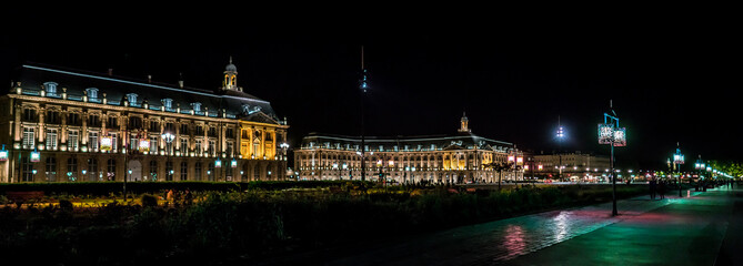 Bordeaux, France, 10 may 2018 - Place de la Bourse at night seen from a distance from the boulevard