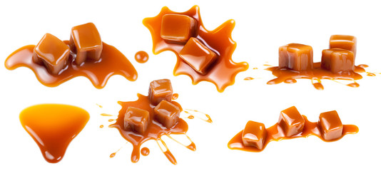 Flowing caramel sauce isolated on white background. Golden Butterscotch toffee caramel liquid .