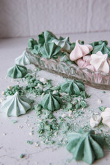 Meringue dessert. Freshly baked sweets made of eggs and sugar. Crispy cookies. Bright colors