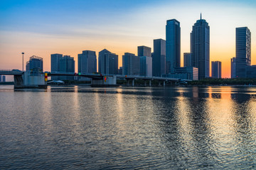 urban skyline and modern buildings at dusk, cityscape of China.