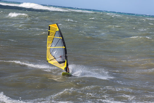 Sea Waves and Wind Surfing in the Summer in Windy Day