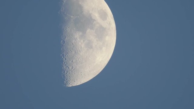 Tokyo,Japan-May 22, 2018: Three alphabets, V,X and L, appear on the surface of the moon around 6PM. This phenomenon is called as Lunar V, Lunar X and Lunar L
