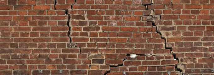 The cracks in an old brick wall. Texture - 206034884