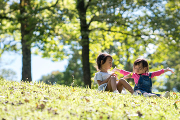 Fototapeta premium two little toddler having fun