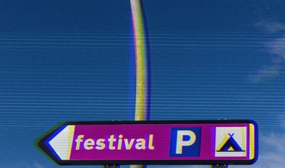 Sign post with festival location