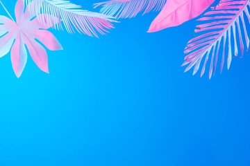 Obraz premium Tropical and palm leaves in vibrant bold gradient holographic neon colors. Concept art. Minimal surrealism summer background.