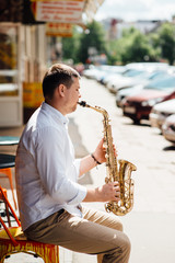 saxophonist playing saxophone jazz music