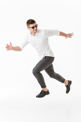 Full length portrait of a confident young man