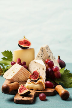 Variety of cheeses on serving board