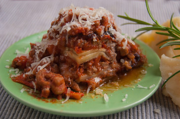 Lasegne with aubergines slides and bolognese souce