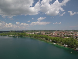 Fototapeta na wymiar Drone en El lago de Bañolas,el lago más grande de Cataluña, en la provincia de Gerona. Es el principal símbolo de la ciudad de Bañolas (Girona,España) Foto aerea con Dron