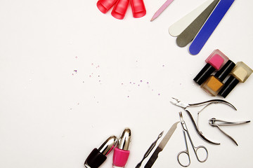 manicure set and nail Polish on white background