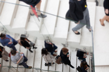 people walking down the stairs