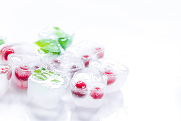 fresh cranberry in ice cubes on white background mock-up