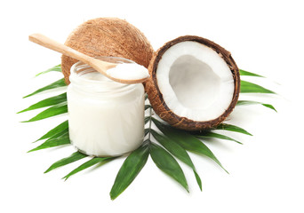 Jar with coconut oil and nuts on white background © New Africa