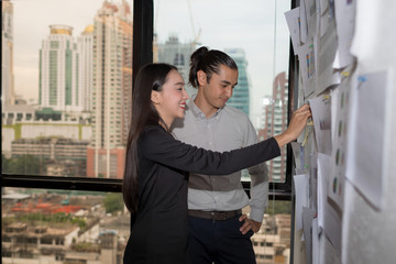 Happy business people working together.Work space concept. Businessmen were brainstorming about their jobs.