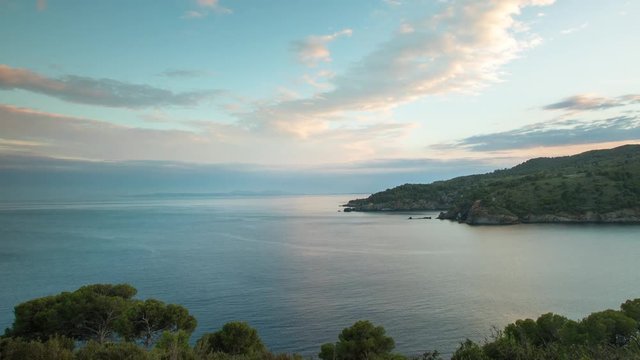 sunset timelapse of the cami de ronda de Roses coastline in catalunya, spain